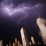 Lightning is seen during a storm under the Memorial Center in Potocari the night before a mass burial