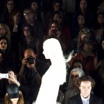 Audience members watch a model during the J. Mendel Spring/Summer 2013 show at New York Fashion Week