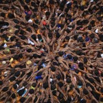 Devotees try to form a human pyramid to break a clay pot containing curd during the celebrations to mark the Hindu festival of Janmashtami in Mumbai