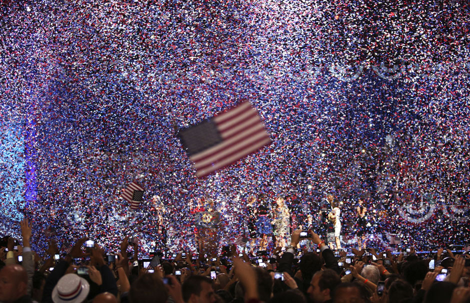 Confetti obscures the stage as U.S. President Barack Obama celebrates after winning the U.S. presidential election in Chicago