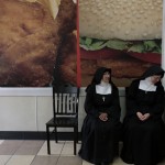 Nuns sit at a fast food restaurant downtown of Guatemala City