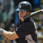 The barrel of Yankees' Boesch's broken bat smacks his face during their MLB spring training game against the Pirates in Bradenton, Florida