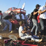 Spectators react after a monster truck rammed the stand where they were watching a monster truck rally show at El Rejon park, Chihuahua