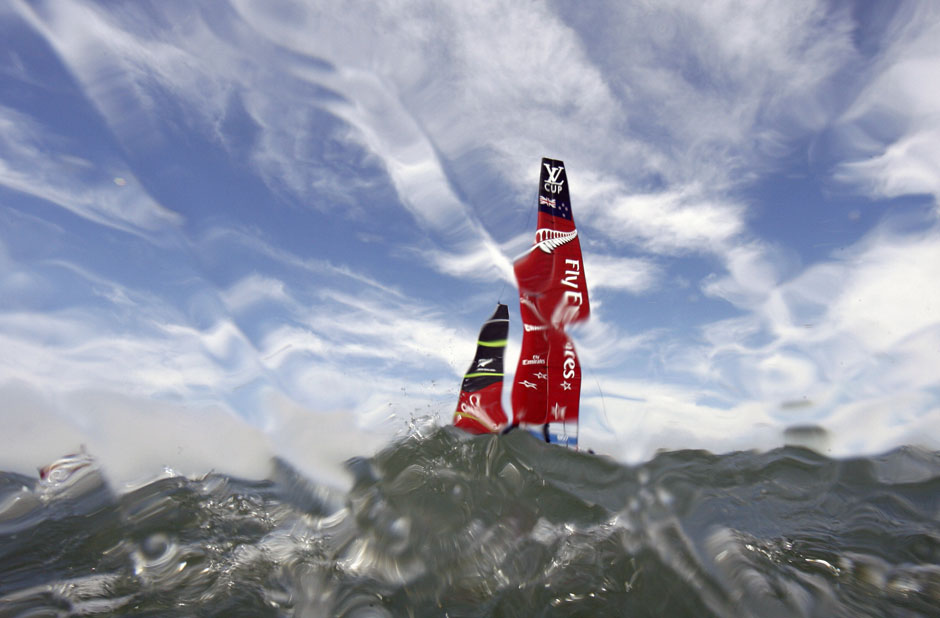The Team Emirates New Zealand sails before the third race of their Louis Vuitton Cup challenger series yacht race against Luna Rossa Challenge in this underwater picture in San Francisco