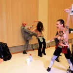 Activists from women's rights group Femen spraying water at Belgian Archbishop of Mechelen-Brussels and Primate of Belgium Leonard during a conference at Brussels university ULB