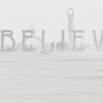 Dust envelops art installation during the Burning Man 2013 arts and music festival in the Black Rock Desert of Nevada