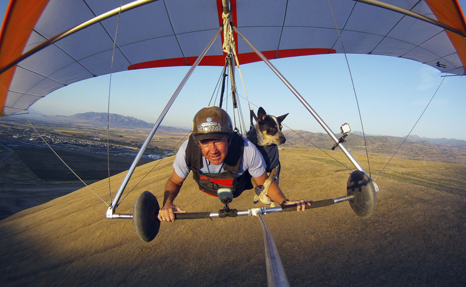 Dan McManus and his service dog Shadow hang glide together outside Salt Lake City, Utah