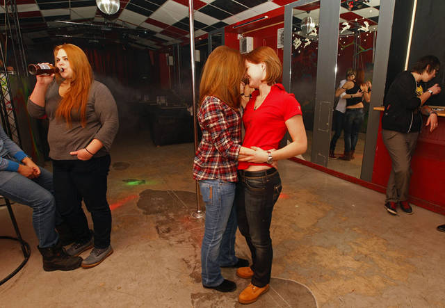 People dance at a private gay club called "Malevich" in St. Petersburg