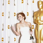 Jennifer Lawrence reacts as she poses with her Oscar after winning the Best Actress award for her role in "Silver Linings Playbook" at the 85th Academy Awards in Hollywood