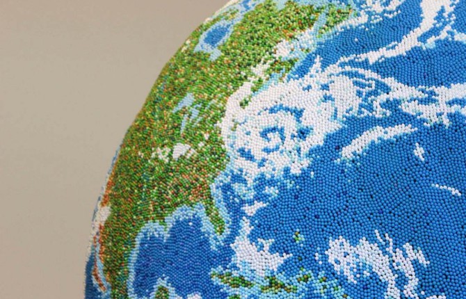 A Globe Made Of Painted Matchsticks