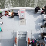 High-Angle Shot of People in a Boat-4