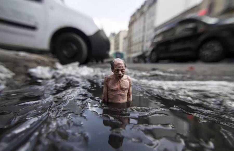 Miniature Sculptures in City Photography