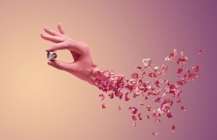 Woman Arm With Flower Petals