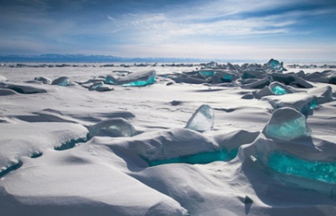 Turquoise Ice Gems Emerging From Russian Lake