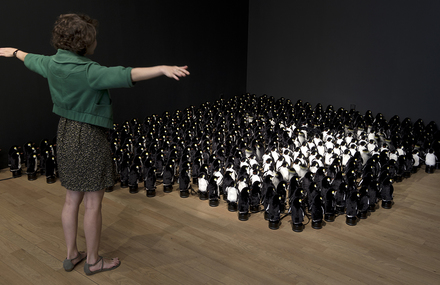 Interactive Mirror Built from 450 Rotating Penguins