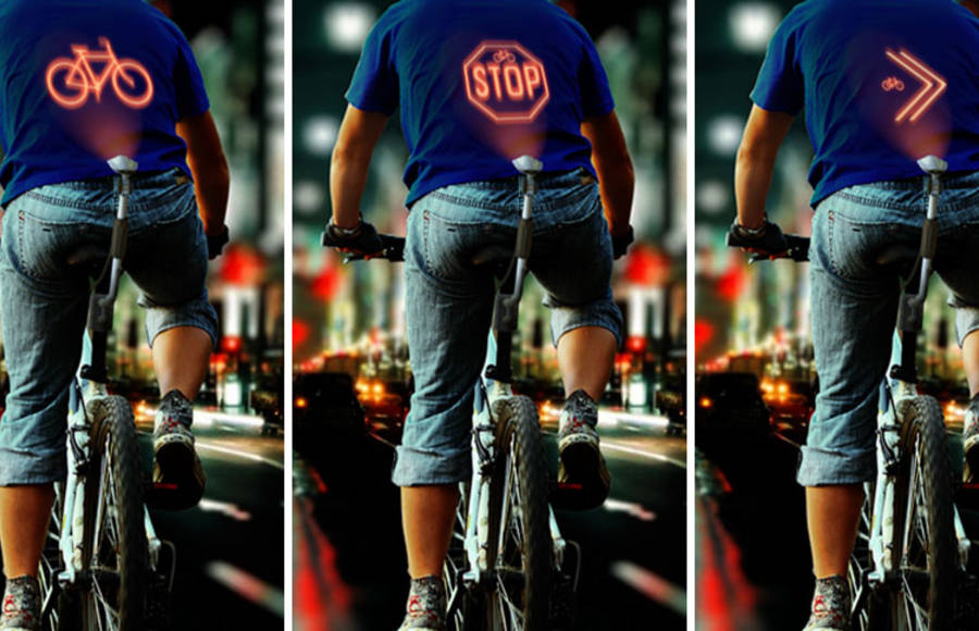 Bicycle Device Showing Illuminated Signals On Cyclist’s Back