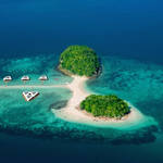 An Aerial View Of An Uninhabited Tropical Island