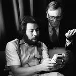 Apple Computer co-founder Steve Wozniak (left) and John Sculley (right), who joined Apple in 1983 as president and CEO looking at the original Game Boy, San Francisco, Ca., 1991.