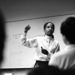 SOFTWARE Engineering Manager Donna Auguste, known by her childhood nickname Fi, leads a meeting of her software team. Auguste worked diligently to achieve cross-cultural representation among the group. April 1992.