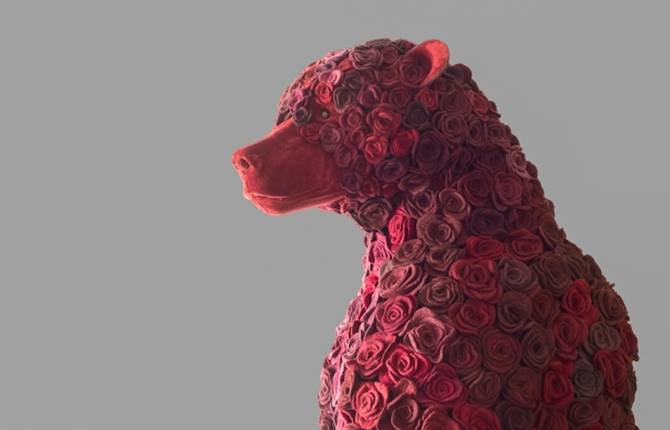 A Bear Sculpture Made of Fake Roses
