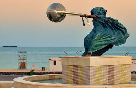 Sculpture of Mother Nature Rotating Earth