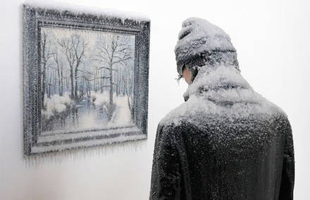Frozen Man alongside Icy Painting