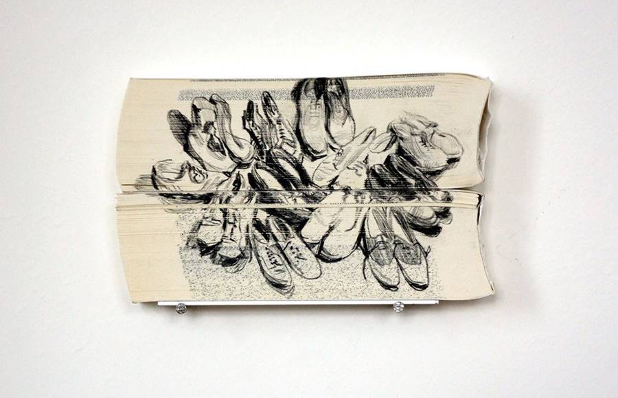 Inventive Pencil Drawings on the Edge of Books