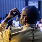 Fashion designer Louison Mbeya watching the fashion show.
The Democratic Republic of the Congo is known for its war, rebels and poverty, but when it comes to style and fashion it’s capital Kinshasa is an inspiration for many people on the African continent. Here fashion is not the motor powering the rapidly growing economy, but rather an effect of this; the current economic and political circumstances are the flywheel that is allowing something that has always been in the population’s DNA to flourish.Kinshasa, Paris of Africa 2025 is part of an ongoing multi media project, named Future Cities. For this project journalist Stephanie Bakker and photographer Yvonne Brandwijk discover the next generation of cities.
Kinshasa’s first launch and print date was on July 15 2015 at the Dutch newspaper de Volkskrant.