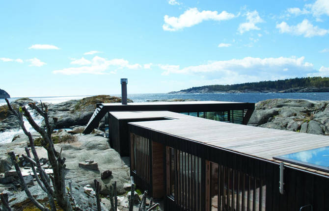 Glass-Walled Home in the Rocks of Norway