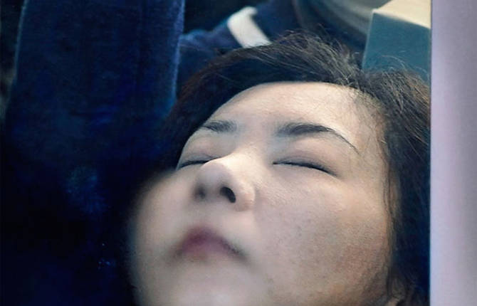 Photographs of Tokyo Commuters Stuck in the Subway