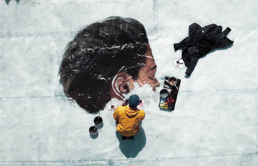 Giant Portraits of a Woman on Ice