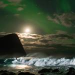 Mick Fanning surfs under the northern lights Lofoten, Norway on November 10, 2016