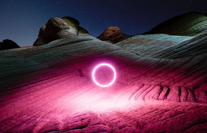 Unique Scenes of Drones Illuminating Night Landscapes
