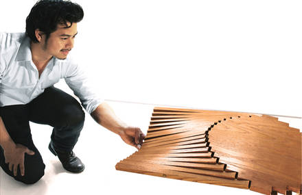 Rising side table by Robert van Embricqs