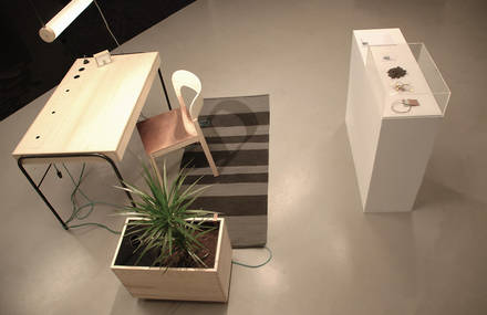 A Green Desk Powered By The Person Sitting At It