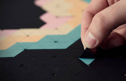 Fabrique Générale – 6080 triangles de papier en affiche