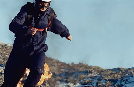 A Man On Fire Jumps Off A Mountain