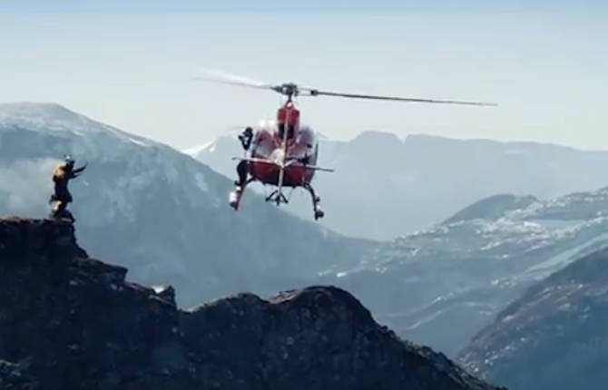 A Man On Fire Jumps Off A Mountain