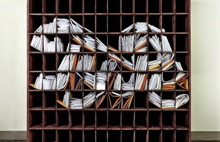 NY Times Logo with Stacks of Mail
