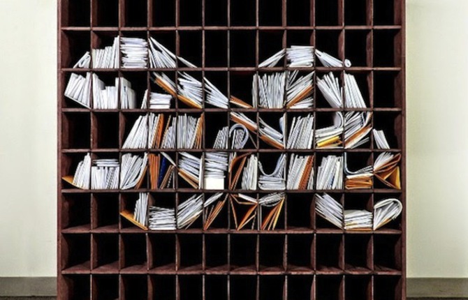 NY Times Logo with Stacks of Mail