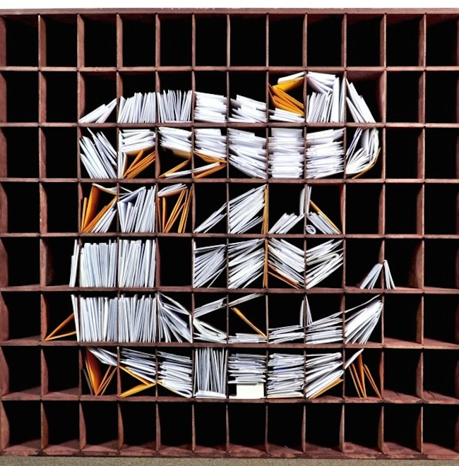 NY Times Logo with Stacks of Mail1