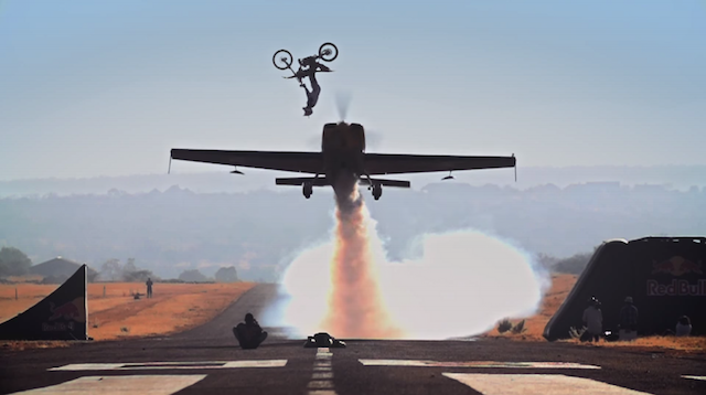Dirtbike_Backflips_over_Aerobatic_Plane_16