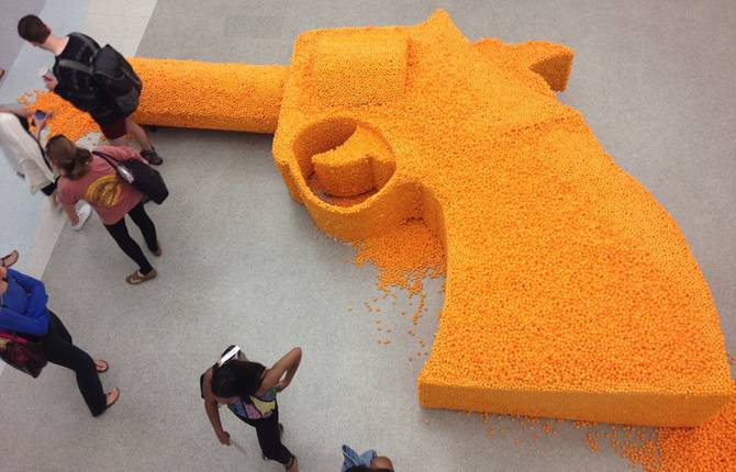Gun Sculpture Made with Cheese Puffs