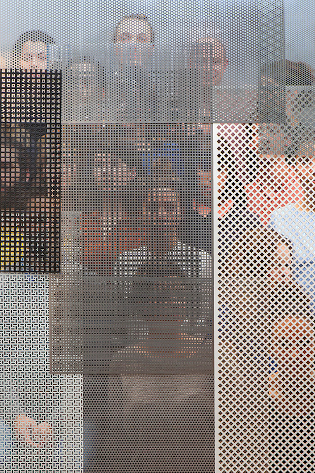 People Behind Perforated Screen-15