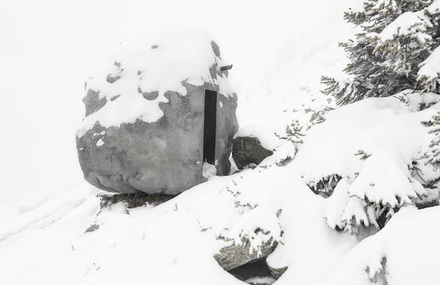 Stone-Shaped Wooden Cabin in Switzerland