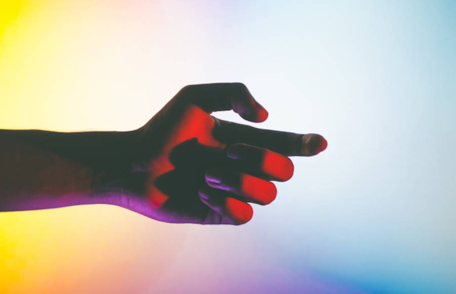 Hands Under Neon Lights