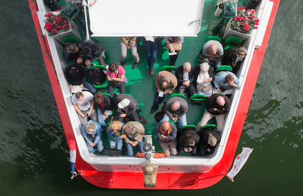 High-Angle Shot of People in a Boat