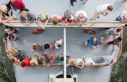 High-Angle Shot of People in a Boat