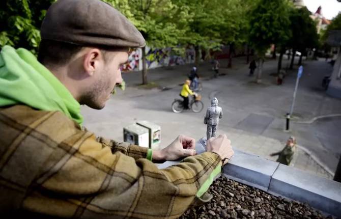 Miniature Sculptures in City Photography