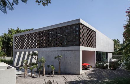 Shadow House with Perforated Screens